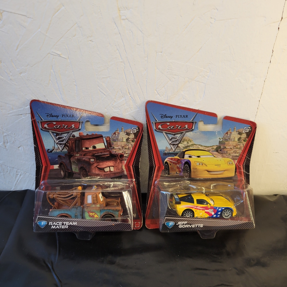 Mattel Disney Pixar Cars 2 die-cast collectible vehicles Mater and Jeff Gorvette
